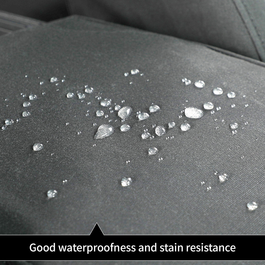 Close-up of a dark gray textured fabric surface with scattered clear water droplets and the text 'Good waterproofness and stain resistance' at the bottom.