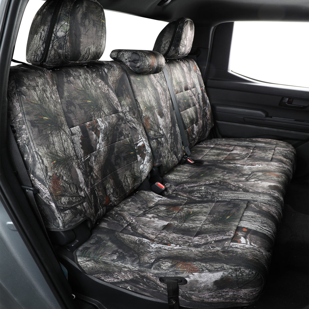Camouflage-patterned car seat covers in a vehicle