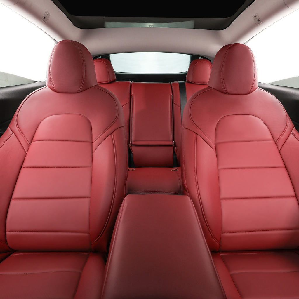 Burgundy leather car seats with a matching center console and headrests, shown from the rear interior view.